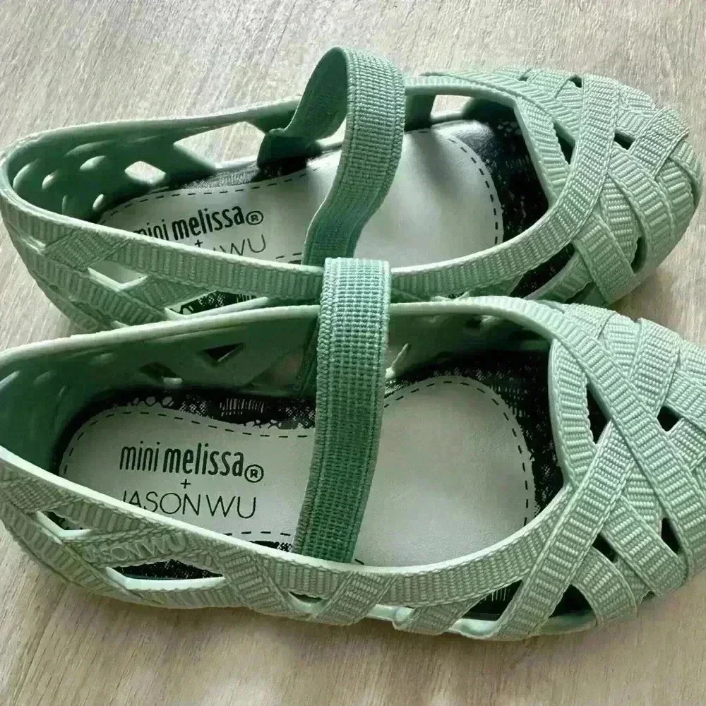 Mini Melissa adorning little